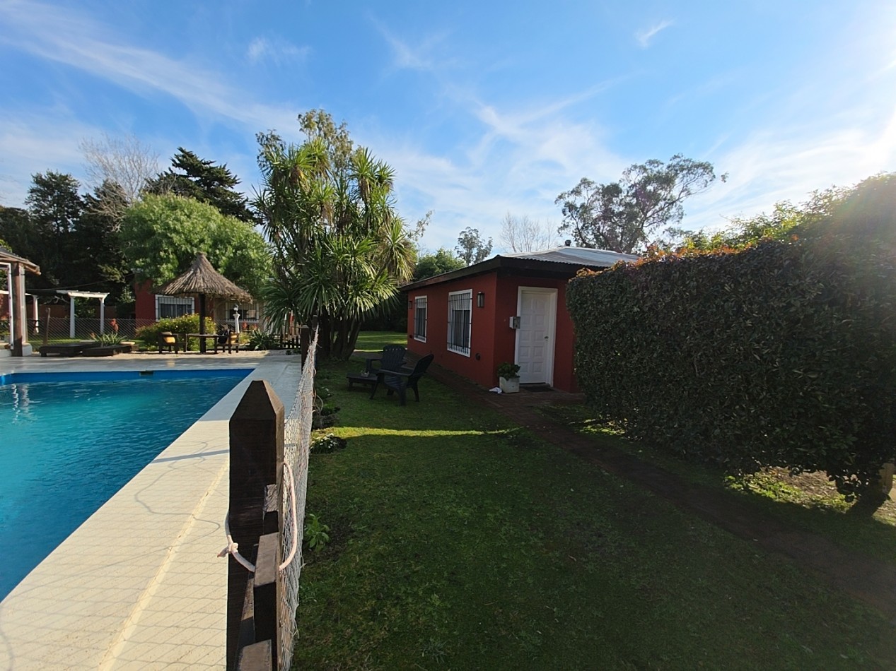 OPORTUNIDAD DE INVERSION, COMPLEJO DE 5 CABAÑAS A METROS DE LA LAGUNA + POSIBILIDAD DE CASA LINDERA