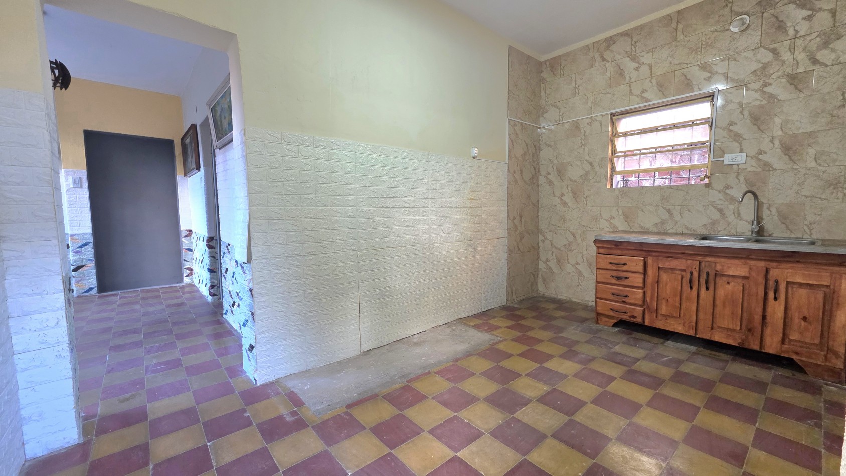 DEPARTAMENTO CON PATIO Y JARDIN 